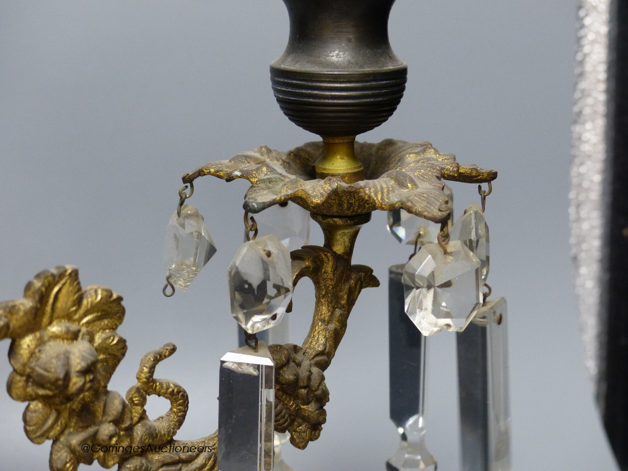 A 19th-century French bronze and ormolu three light candelabrum, 39cm high